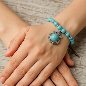 Turquoise Beaded Bracelet with Silver Pendant